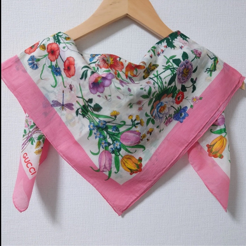 Gucci silk scarf, floral motif with pink border, signed: "Gucci."
